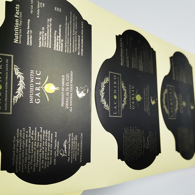La hoja de oro cortada con tintas que sella la comida brillante etiqueta adhesivo forma de encargo